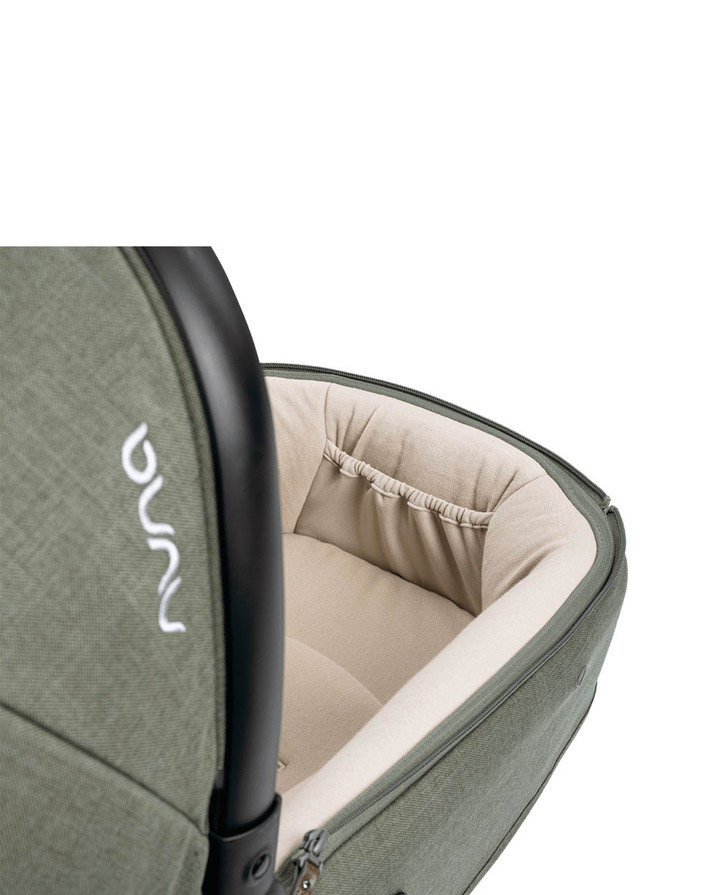 Cari Aire carrycot Pine colour  Nuna